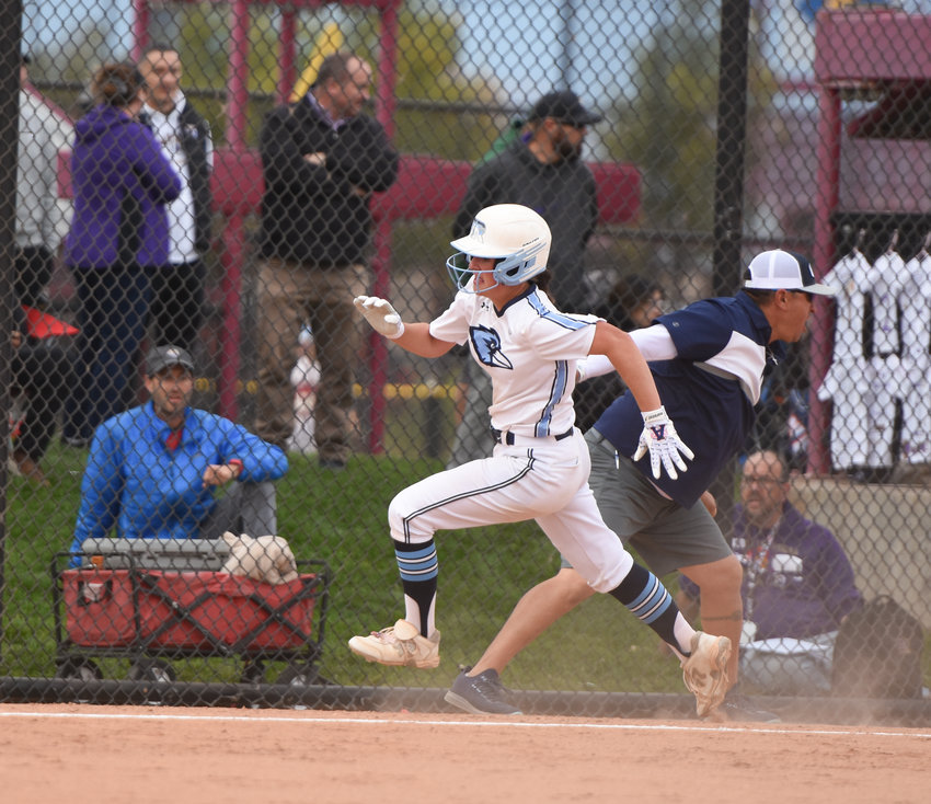 Riverdale Ridge senior Sienna Mullin scores the first of three Ravens' runs in the top of the fourth inning against Holy Family in a CHSAA 4A semifinal game Oct. 23 at Aurora Sports Park. The Ravens' tallies did not stand, as Holy Family won 7-3.